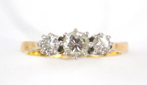 An 18ct gold and diamond three stone ring