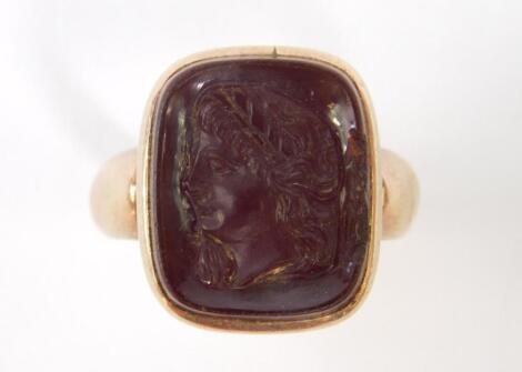 A gentleman's cornelian set signet ring