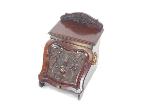 A Victorian mahogany coal scuttle