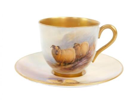 A Royal Worcester porcelain coffee cup and saucer