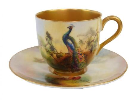 A Royal Worcester porcelain coffee cup and saucer