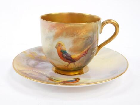 A Royal Worcester porcelain coffee cup and saucer