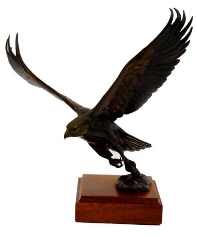 A bronze sculpture of a Golden Eagle