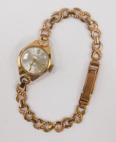 *An Empress 9ct gold cased lady's wrist watch
