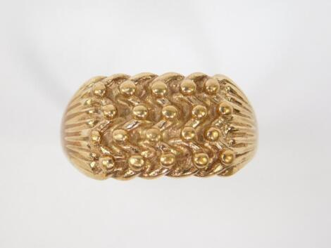 A gentleman's 9ct gold keeper ring