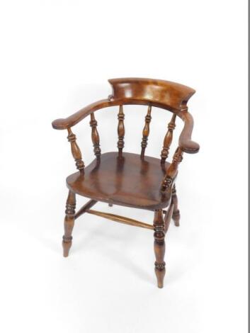 A Victorian oak captain's chair