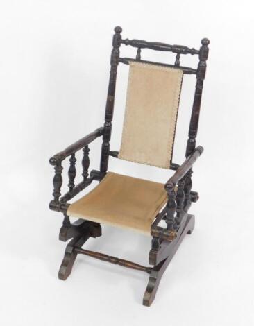 A 19thC oak child's rocking chair