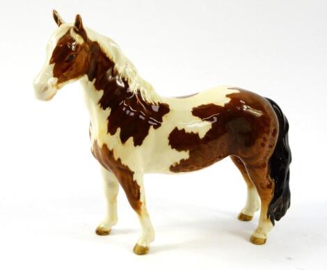 A Beswick figure of a Pinto Skewbald Pony.