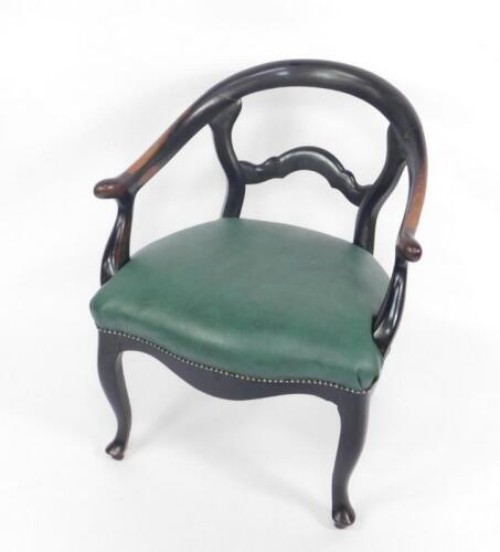 A Victorian ebonised open tub chair