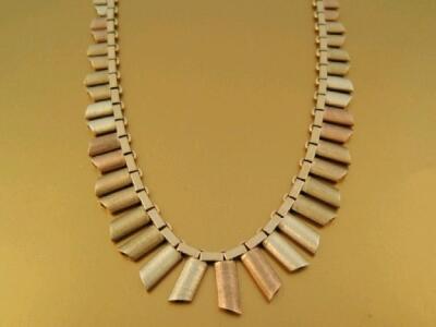 A graduated tri-colour 9ct gold brickette necklace