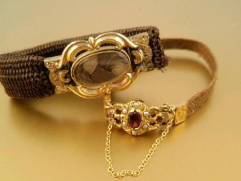 Two Victorian memorial woven hair bracelets with yellow metal clasps