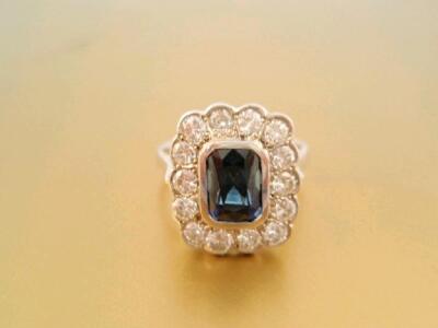 A rectangular sapphire and diamond cluster dress ring