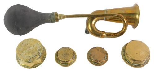 A vintage brass car horn