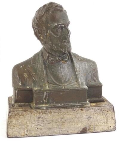 A 19thC cast metal bust of Abraham Lincoln