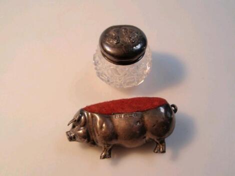 An Edwardian silver pig pin cushion by Levi & Solomon