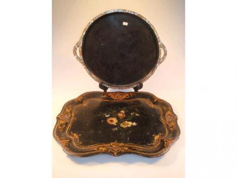 A Victorian papier mach? serving tray with gilt and floral painted decoration