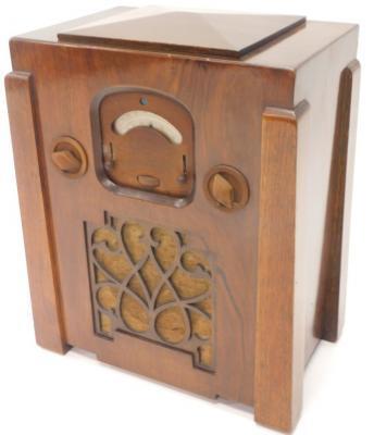 An Art Deco walnut and Bakelite valve radio