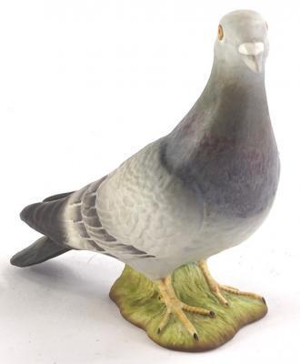 A Beswick matt glazed model of a pigeon