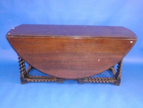 A 17th century and later oak wake table the base having a barley twist