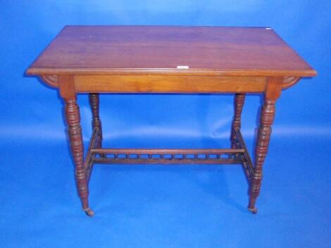 A late Victorian walnut centre table with moulded rectangular top