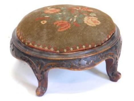 A Victorian mahogany footstool