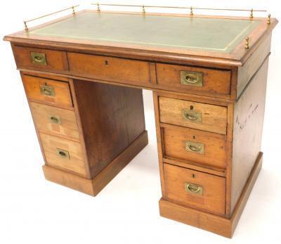 A 19thC mahogany campaign style pedestal desk