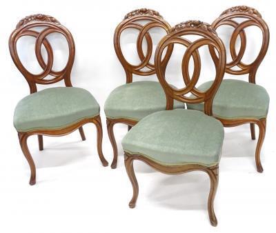 A set of four late 19thC Continental balloon back chairs