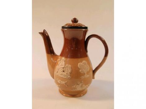 A Doulton Lambeth stoneware two tone coffee pot with relief moulded hunting