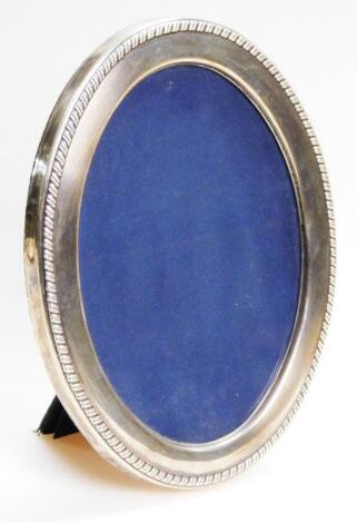 An Elizabeth II silver fronted photograph frame