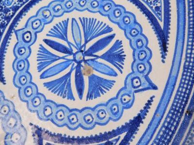 A 17thC style Islamic pottery blue and white charger - 5