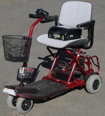 A four wheel shop mobility scooter