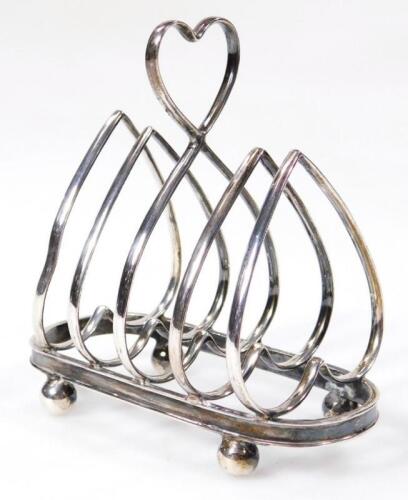 An Edwardian silver four sectional toast rack