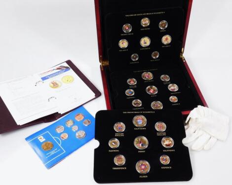 A cased emblem series decimal coin set