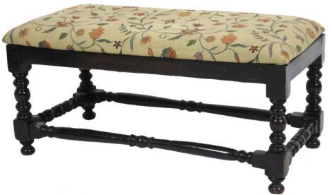 A Jacobean style ebonised oak stool