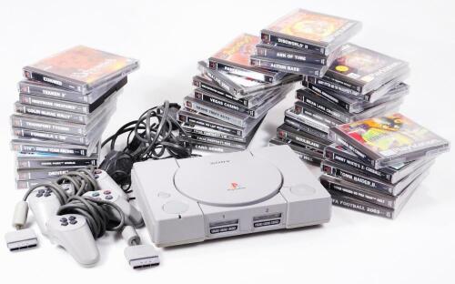 An original Playstation 1 games console