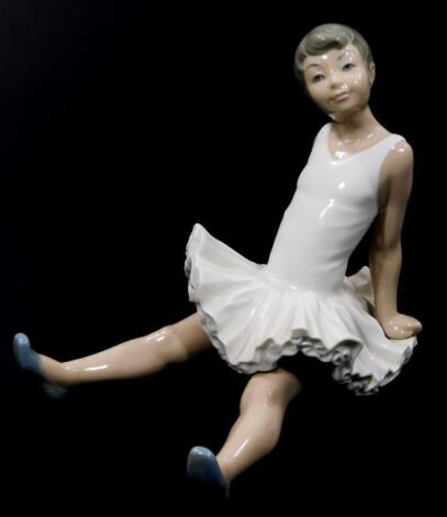 A Nao Lladro figure of a seated ballerina
