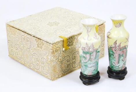 A pair of Chinese porcelain famille jaune vases