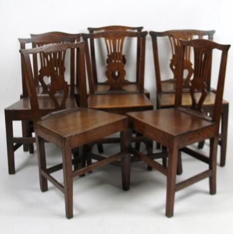 A Harlequin set of eight 19thC oak country Chippendale style chairs