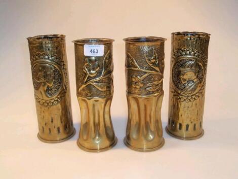 A pair of brass shell case vases with cameo profile portraits