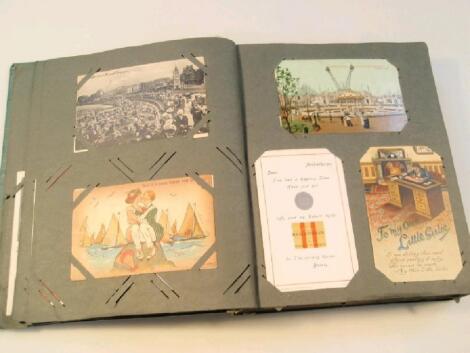 An Early 20thC Postcard Album containing approx 240 cards