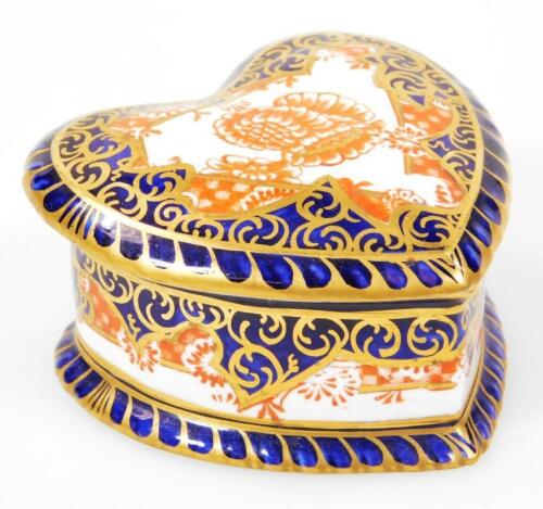 A Royal Crown Derby heart shaped trinket box