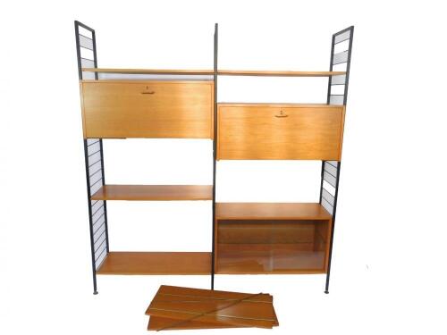 A Staples Ladderax teak two sectional modular unit