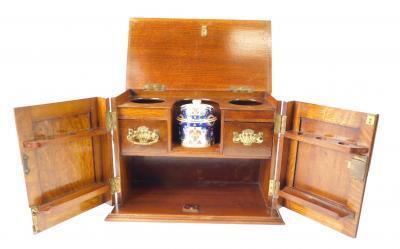 A Victorian oak smoker's cabinet