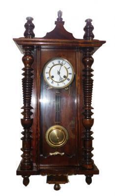 A Continental oak late 19thC wall clock