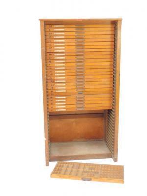 A Stephenson Blake oak typesetter's cabinet