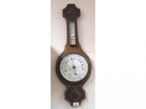 An Edwardian mahogany aneroid wheel barometer