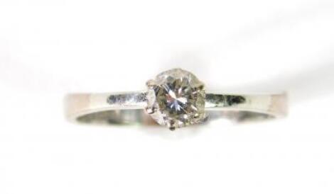 A diamond solitaire ring