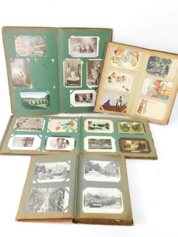 Four albums of Edwardian sentimental and topographical postcards