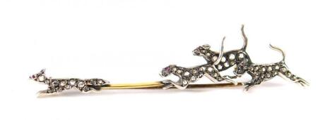 A Victorian diamond fox and hounds brooch