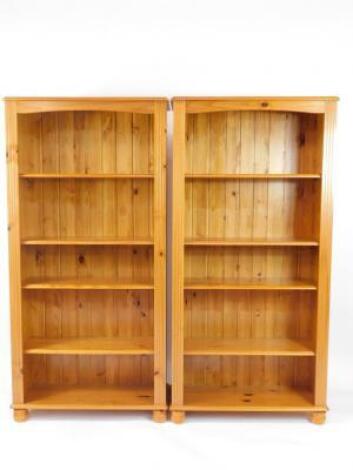 A pair of pine open bookcases